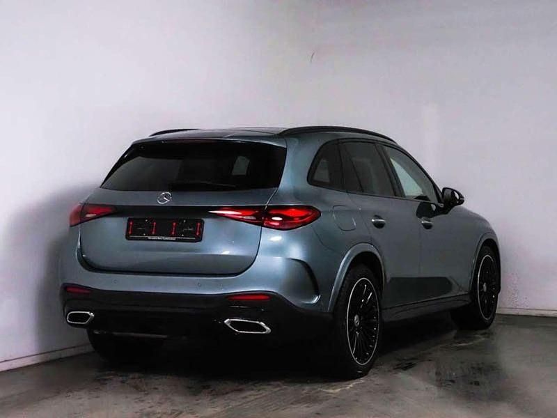 Gebraucht Mercedes GLC300 AMG 269 PS (197 kW) 2024 Metalliclack verdesilber SUV