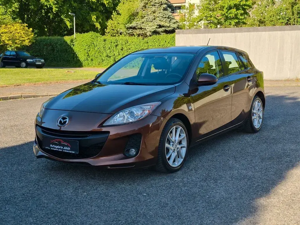 Second-hand Mazda 3 Edition 105 CP (77 kW) 2012 Maro Berlinǎ