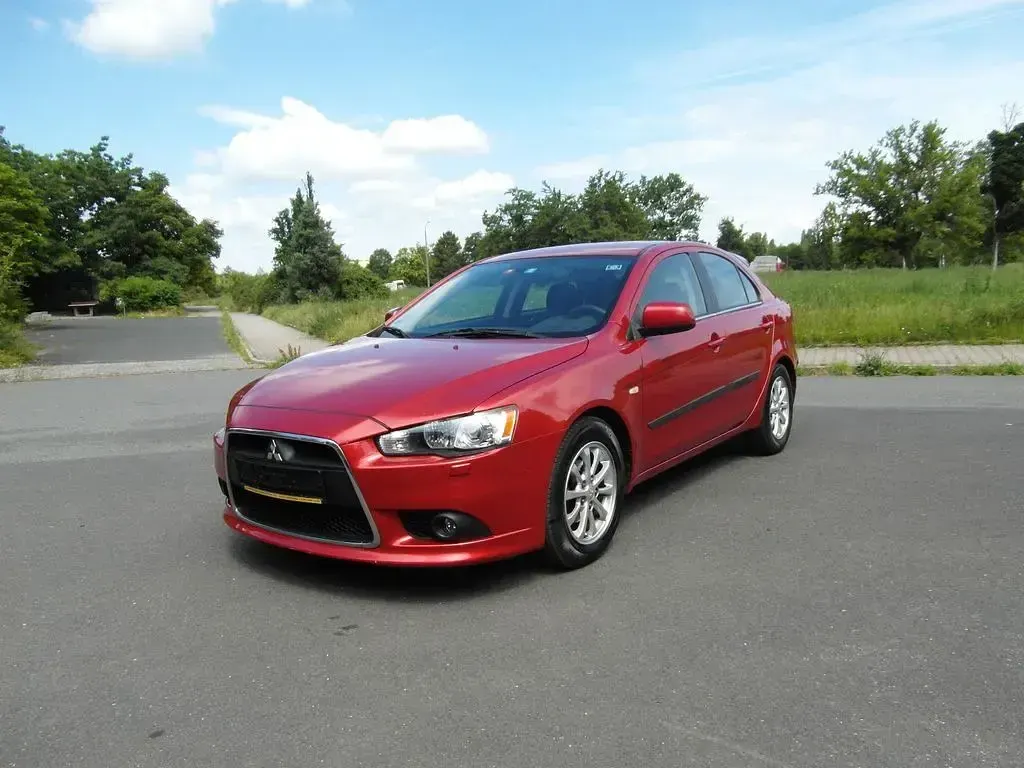 Gebraucht Mitsubishi Lancer Sportback 117 PS (86 kW) 2012 Rot Limousine