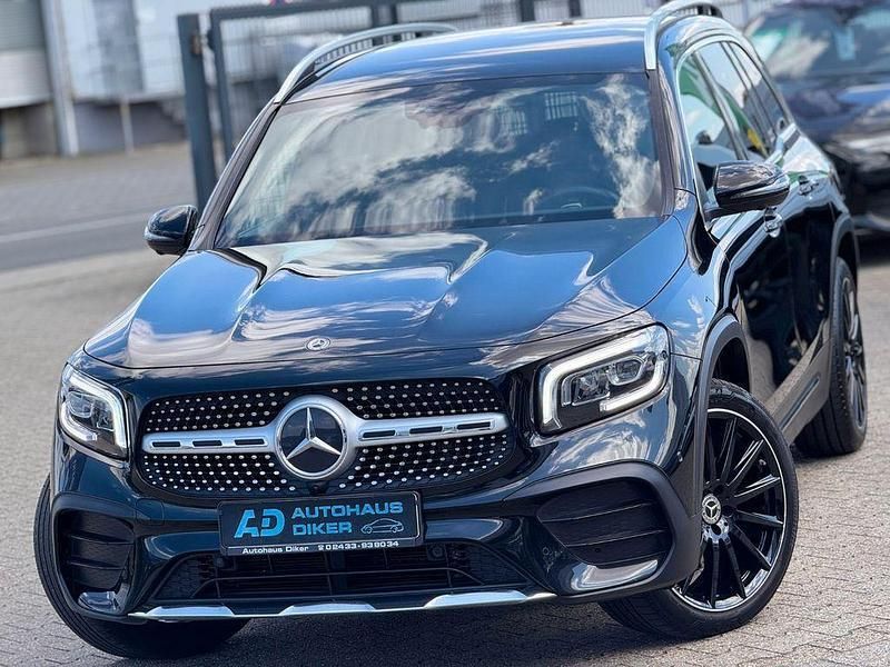 Schwarz Gebraucht 2021 Mercedes GLB200 AMG line SUV | 26.900 € (Teuer) - Bild 1/4