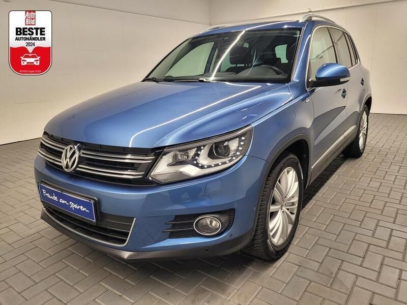Blau (pacificblaumet.) Gebraucht 2014 VW Tiguan Sport SUV | 15.980 € (Etwas zu teuer) - Bild 1/4
