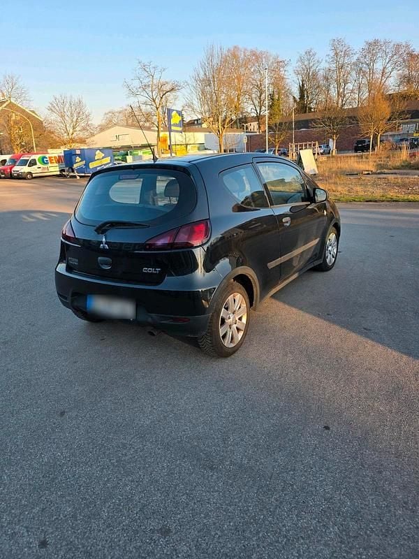 Gebraucht Mitsubishi Colt 75 PS (55 kW) 2011 Schwarz Kleinwagen