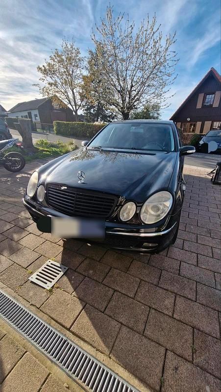 Second-hand Mercedes E200 Avantgarde 163 CP (119 kW) 2005 Negru Berlinǎ
