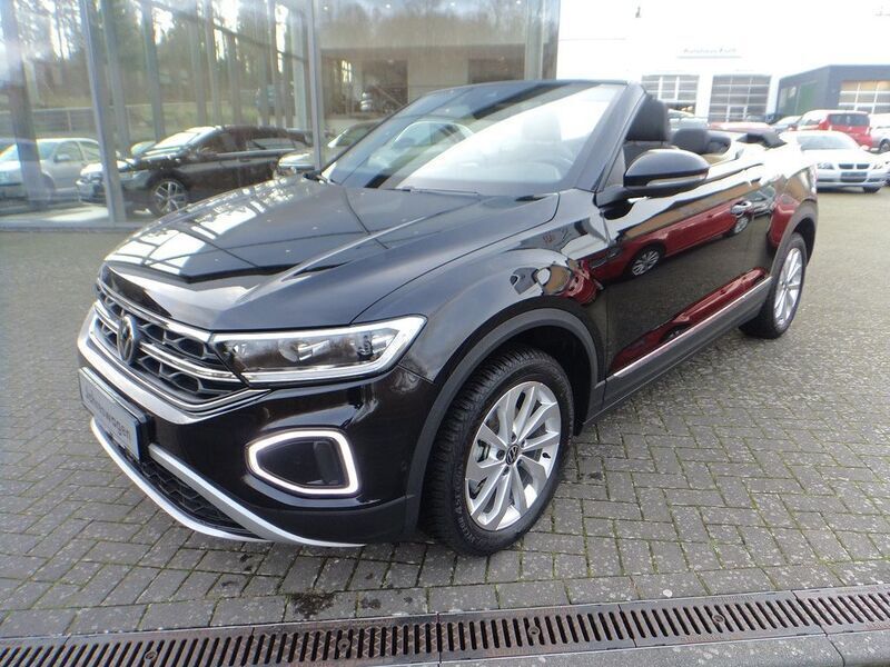 Schwarz Gebraucht 2024 VW T-Roc Cabriolet Style Cabrio | 28.299 € (Fairer Preis) - Bild 1/4