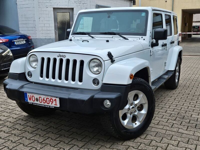 Bright white clear coat Gebraucht 2015 Jeep Wrangler Unlimited Sahara SUV | 27.499 € - Bild 1/4