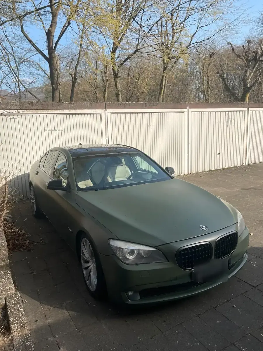 Second-hand BMW 740 306 CP (225 kW) 2011 Albastru Berlinǎ