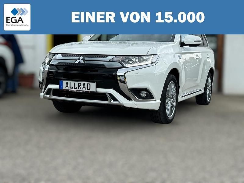 Weiß metallic Gebraucht 2019 Mitsubishi Outlander P-HEV Top | 24.490 € (Fairer Preis) - Bild 1/4