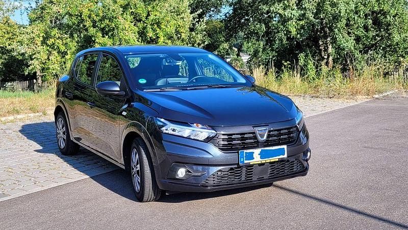 Grau Gebraucht 2021 Dacia Sandero Comfort Kleinwagen | 12.500 € (Fairer Preis) - Bild 1/4