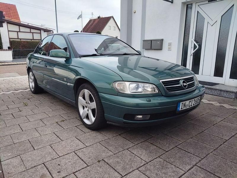 Grün Gebraucht 2001 Opel Omega Design Edition Limousine | 2.222 € (Fairer Preis) - Bild 1/4