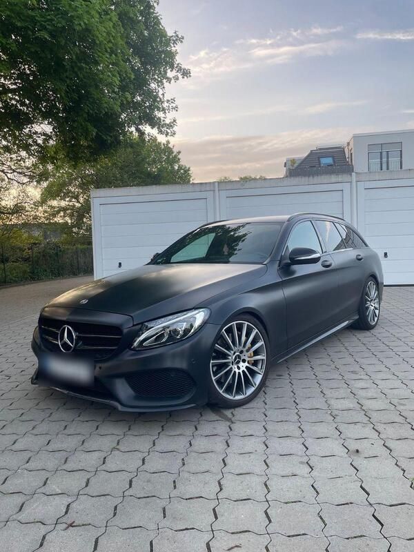 Schwarz Gebraucht 2015 Mercedes C250 AMG line Kombi | 15.900 € (Teuer) - Bild 1/4