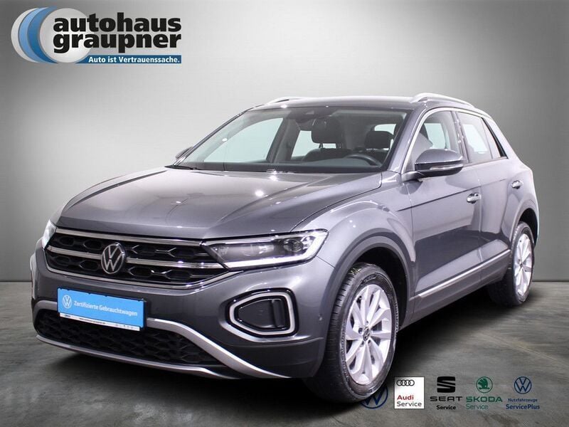 Indiumgrau Gebraucht 2023 VW T-Roc Style SUV | 22.882 € (Fairer Preis) - Bild 1/4