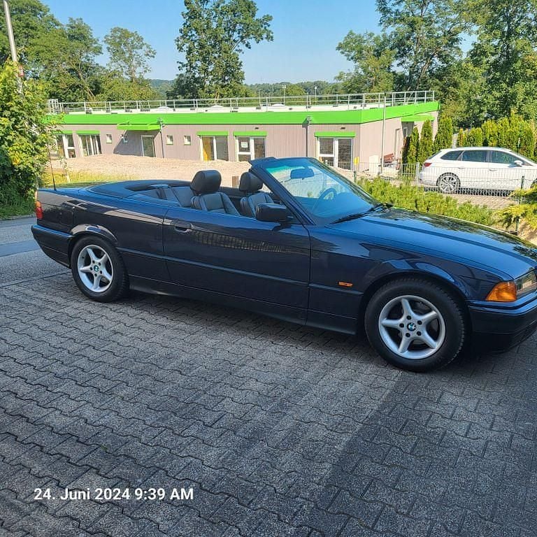 Gebraucht BMW 318 Cabriolet 116 PS (85 kW) 1997 Violet Cabrio