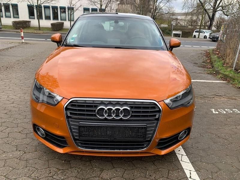Orange Gebraucht 2013 Audi A1 Sportback Ambition Kleinwagen | 6.399 € (Fairer Preis) - Bild 1/4
