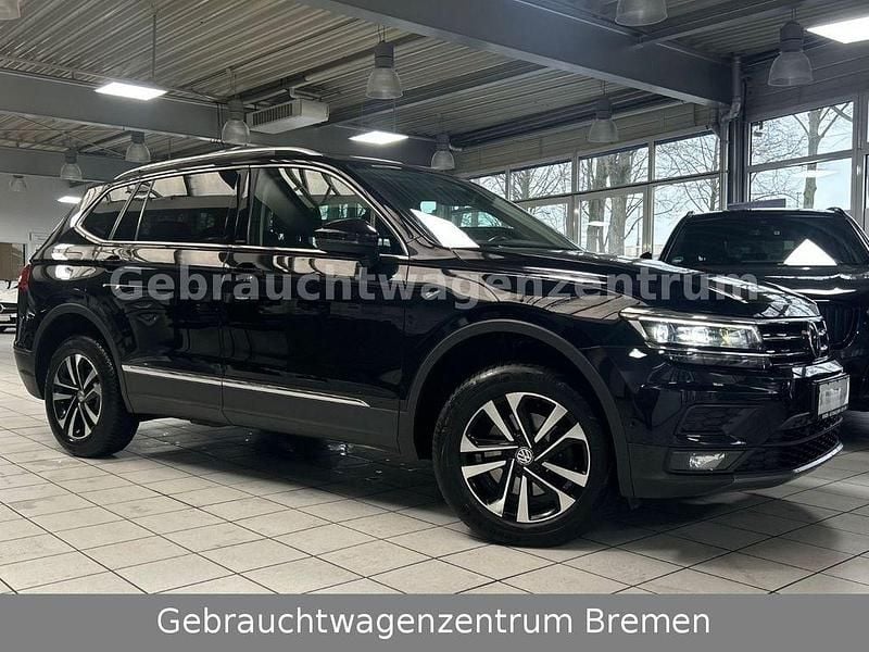 Schwarz Gebraucht 2019 VW Tiguan Allspace IQ Drive SUV | 16.990 € (Fairer Preis) - Bild 1/4