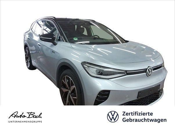 Silber (scale silver metallic/schwarz) Gebraucht 2025 VW ID.4 GTX SUV | 41.530 € (Guter Preis) - Bild 1/4