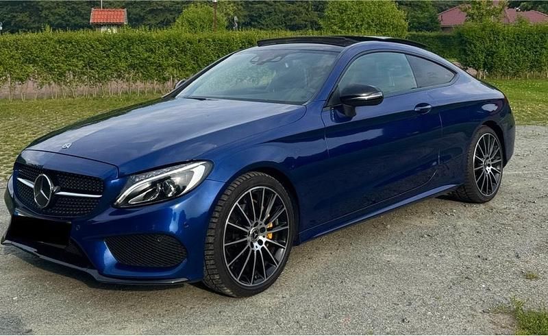 Blau Gebraucht 2017 Mercedes 200 AMG line Coupé | 20.000 € - Bild 1/4