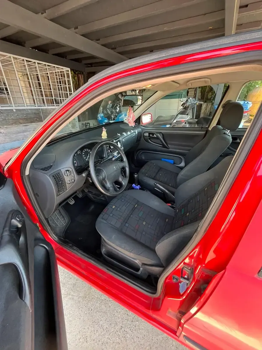 Używany VW Polo 60 KM (44 kW) 1999 Czerwony Hatchback