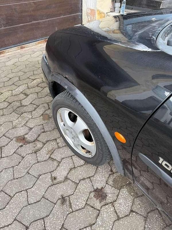 Gebraucht Opel Corsa 54 PS (39 kW) 2000 Schwarz Limousine