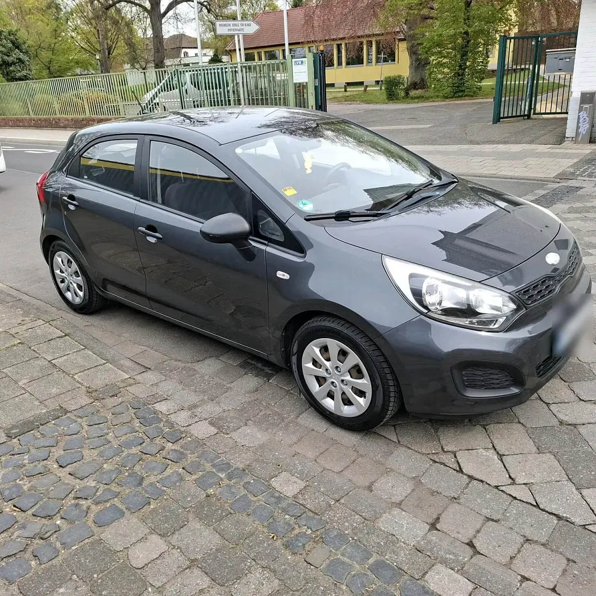 Używany Kia Rio 84 KM (61 kW) 2014 Szary Hatchback