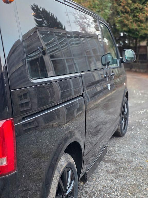 Używany VW Caravelle 140 KM (102 kW) 2013 Czarny Van