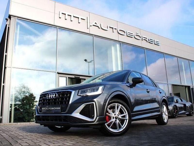 Grau Gebraucht 2021 Audi Q2 S-Line SUV | 26.900 € (Guter Preis) - Bild 1/4
