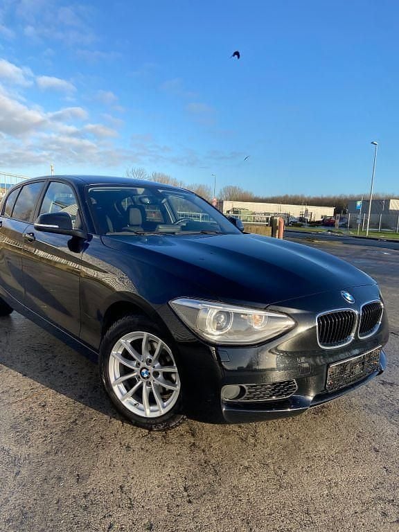 Schwarz Gebraucht 2013 BMW 116 Kleinwagen | 6.400 € (Fairer Preis) - Bild 1/4