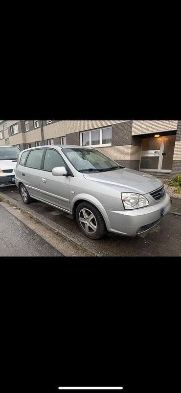 Gebraucht Kia Carens 113 PS (83 kW) 2006 Silber Van / Kleinbus
