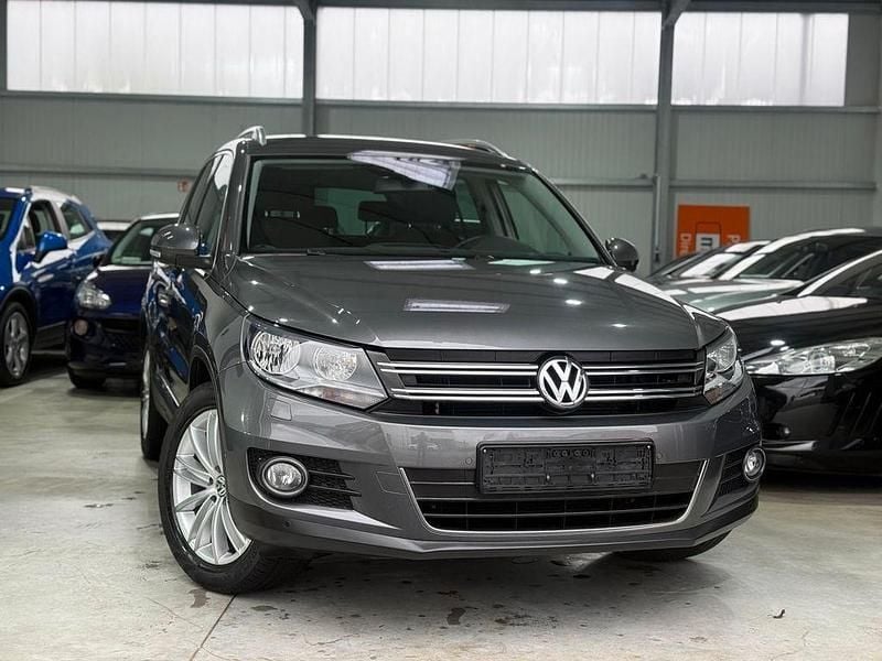 Grau Gebraucht 2014 VW Tiguan Sportline SUV | 10.900 € (Superpreis) - Bild 1/4