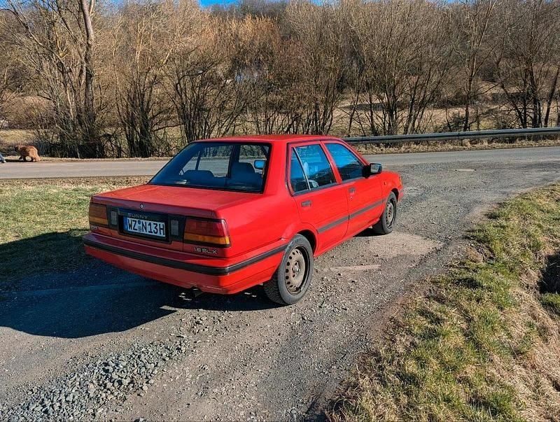 Gebraucht Nissan Sunny 73 PS (53 kW) 1988 Rot Limousine
