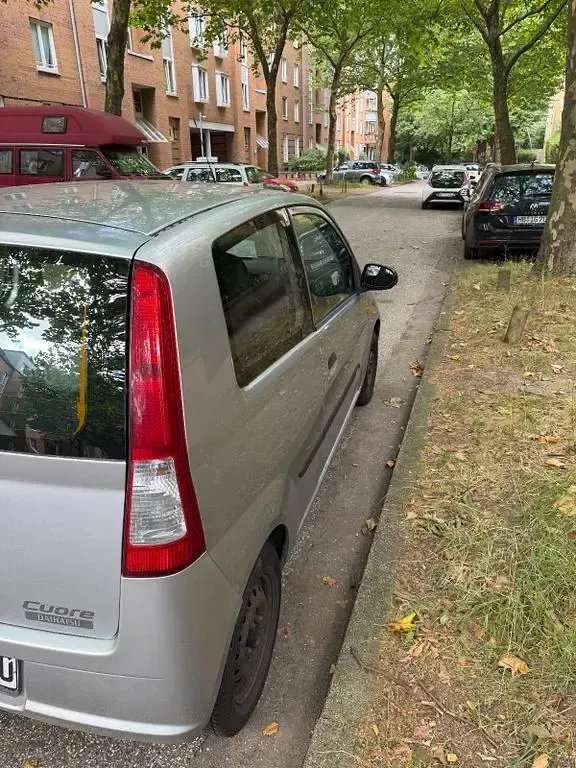 Gebraucht Daihatsu Cuore Plus 58 PS (42 kW) 2004 Grau Kleinwagen