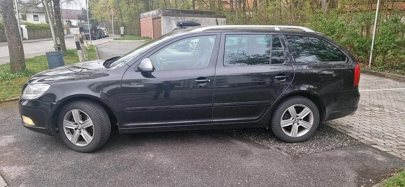 Second-hand Skoda Octavia 140 CP (102 kW) 2012 Negru Break