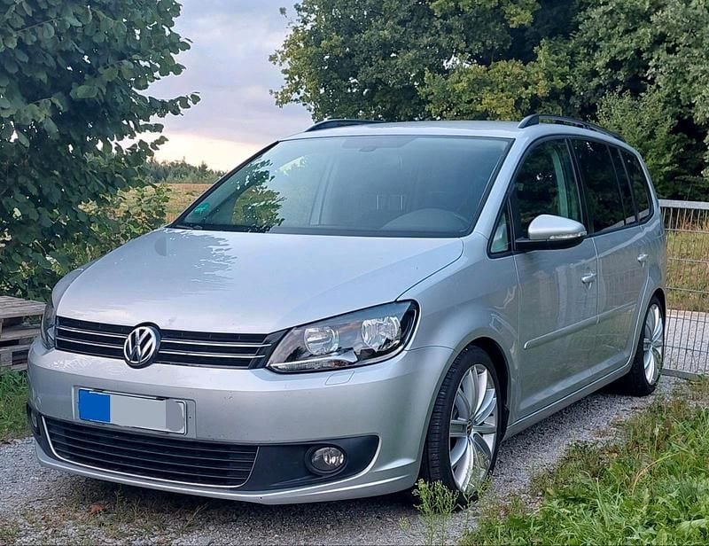 Silber Gebraucht 2010 VW Touran Van / Kleinbus | 9.555 € - Bild 1/2