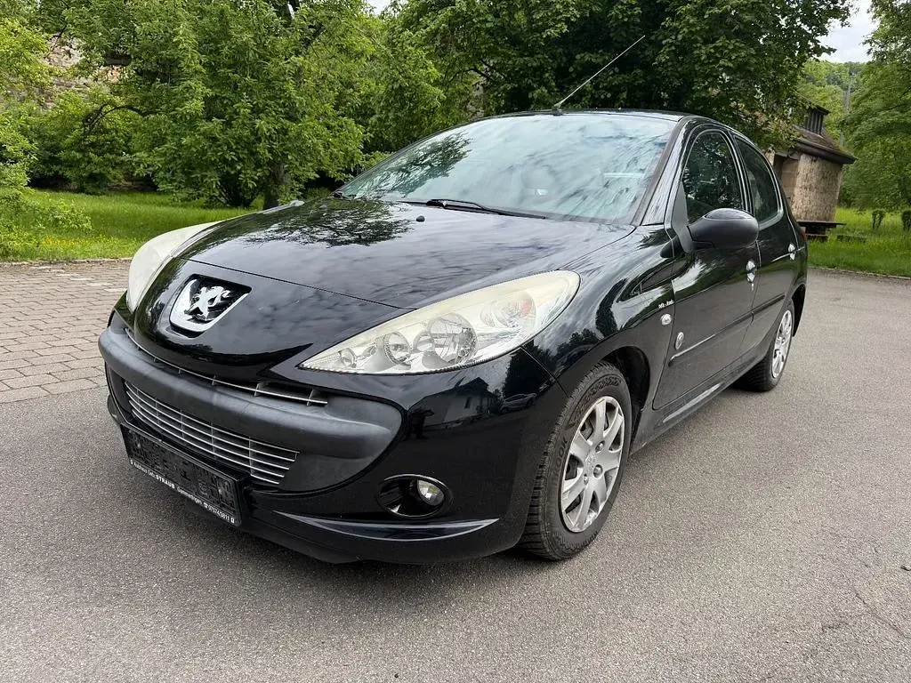 Gebraucht Peugeot 206 73 PS (53 kW) 2012 Schwarz Limousine