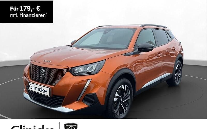 Orange Gebraucht 2023 Peugeot e-2008 Allure SUV | 16.870 € (Superpreis) - Bild 1/4
