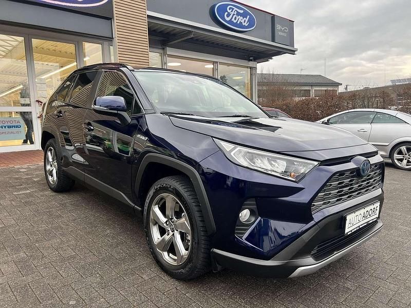 Blau Gebraucht 2021 Toyota RAV4 Hybrid Comfort SUV | 30.780 € (Guter Preis) - Bild 1/4