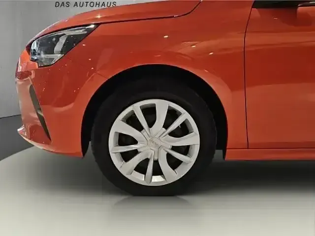 Gebraucht Opel Corsa-e Edition 100 kW (136 PS) 2023 Power orange/dynamik orange Kleinwagen
