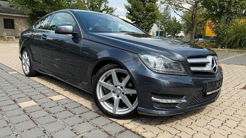 Grau Gebraucht 2012 Mercedes C180 AMG line Coupé | 10.600 € (Guter Preis) - Bild 1/4