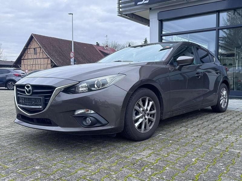 Obsidiangrau metallic Gebraucht 2014 Mazda 3 Center-Line Kleinwagen | 5.990 € (Guter Preis) - Bild 1/4