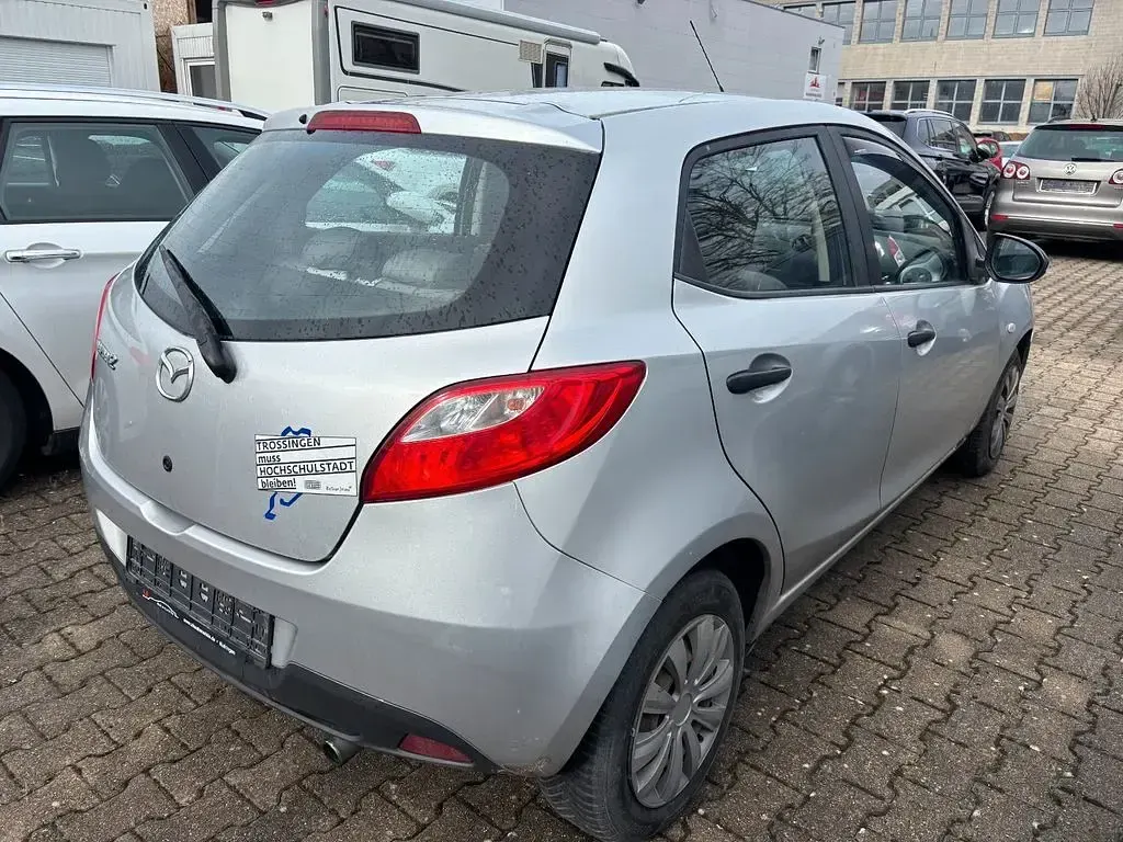 Używany Mazda 2 Impuls 75 KM (55 kW) 2008 Srebrny Hatchback