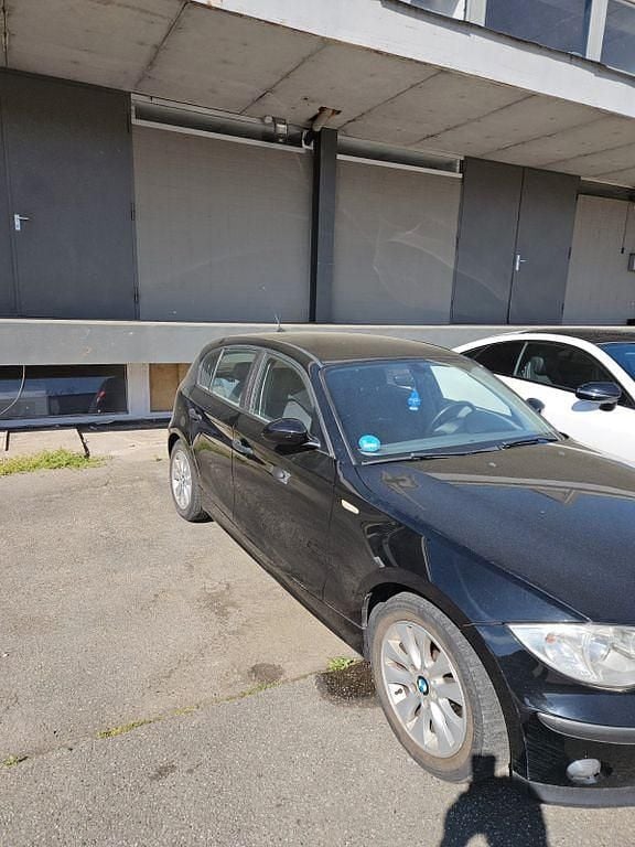 Second-hand BMW 116 122 CP (89 kW) 2004 Negru Hatchback