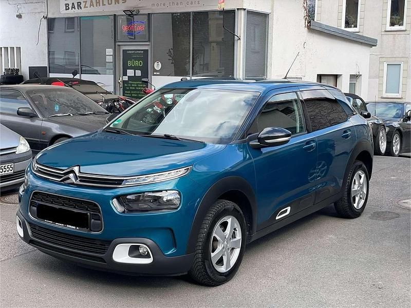 Ultra smaragd perlmutt/metall Gebraucht 2018 Citroën C4 Cactus Shine Kleinwagen | 5.750 € (Fairer Preis) - Bild 1/4