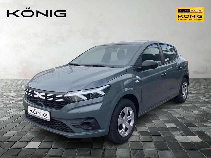 Grau Gebraucht 2025 Dacia Sandero Essentiel Kleinwagen | 13.850 € (Superpreis) - Bild 1/4