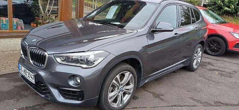Grau Gebraucht 2018 BMW X1 Sport Line SUV | 22.999 € (Fairer Preis) - Bild 1/4