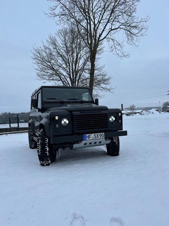 Schwarz Gebraucht 2013 Land Rover Defender Kombi | 54.599 € (Fairer Preis) - Bild 1/4