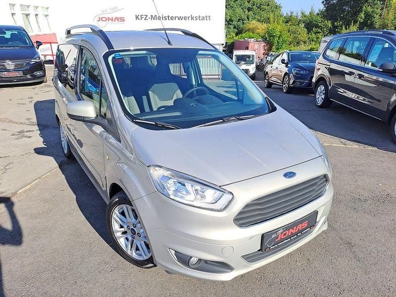 Silber Gebraucht 2014 Ford Tourneo Courier Trend Van / Kleinbus | 10.900 € (Fairer Preis) - Bild 1/4