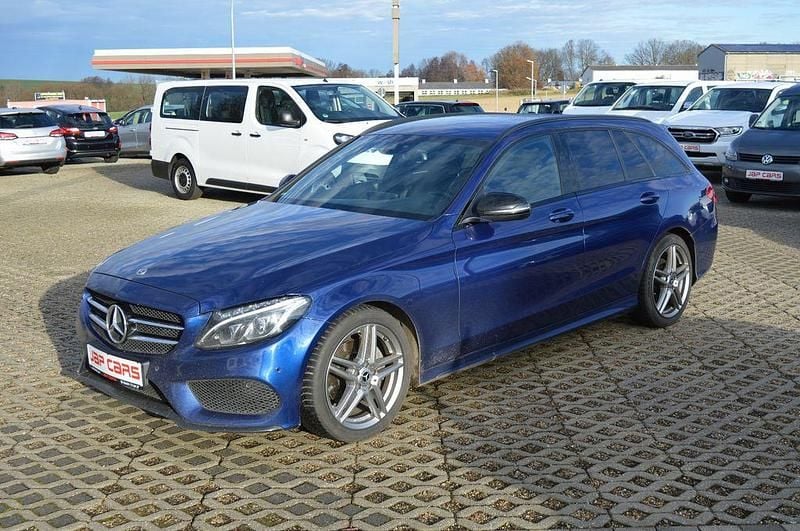 Blau Gebraucht 2017 Mercedes C220 AMG line Limousine | 12.990 € (Superpreis) - Bild 1/4