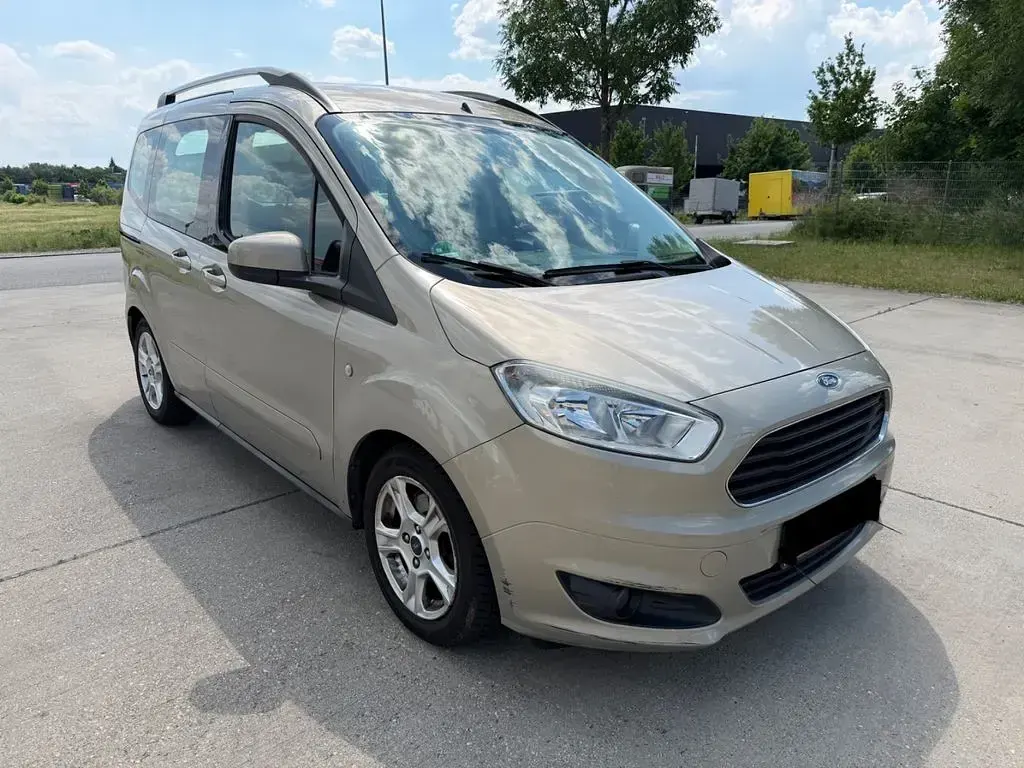 Gebraucht Ford Tourneo Courier Trend 101 PS (74 kW) 2014 Silber Van / Kleinbus
