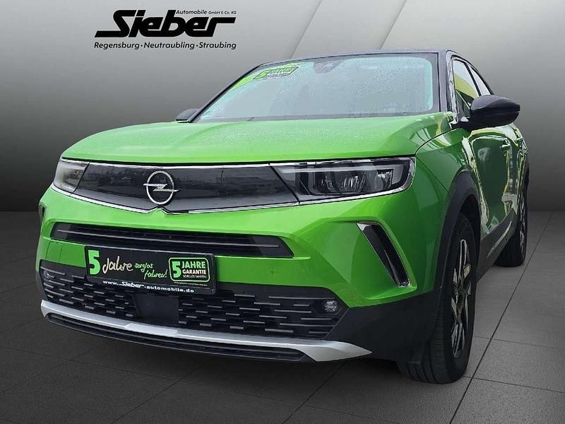 Gebraucht Opel Mokka-e Elegance 100 kW (136 PS) 2022 Matcha green/ikone gruen SUV