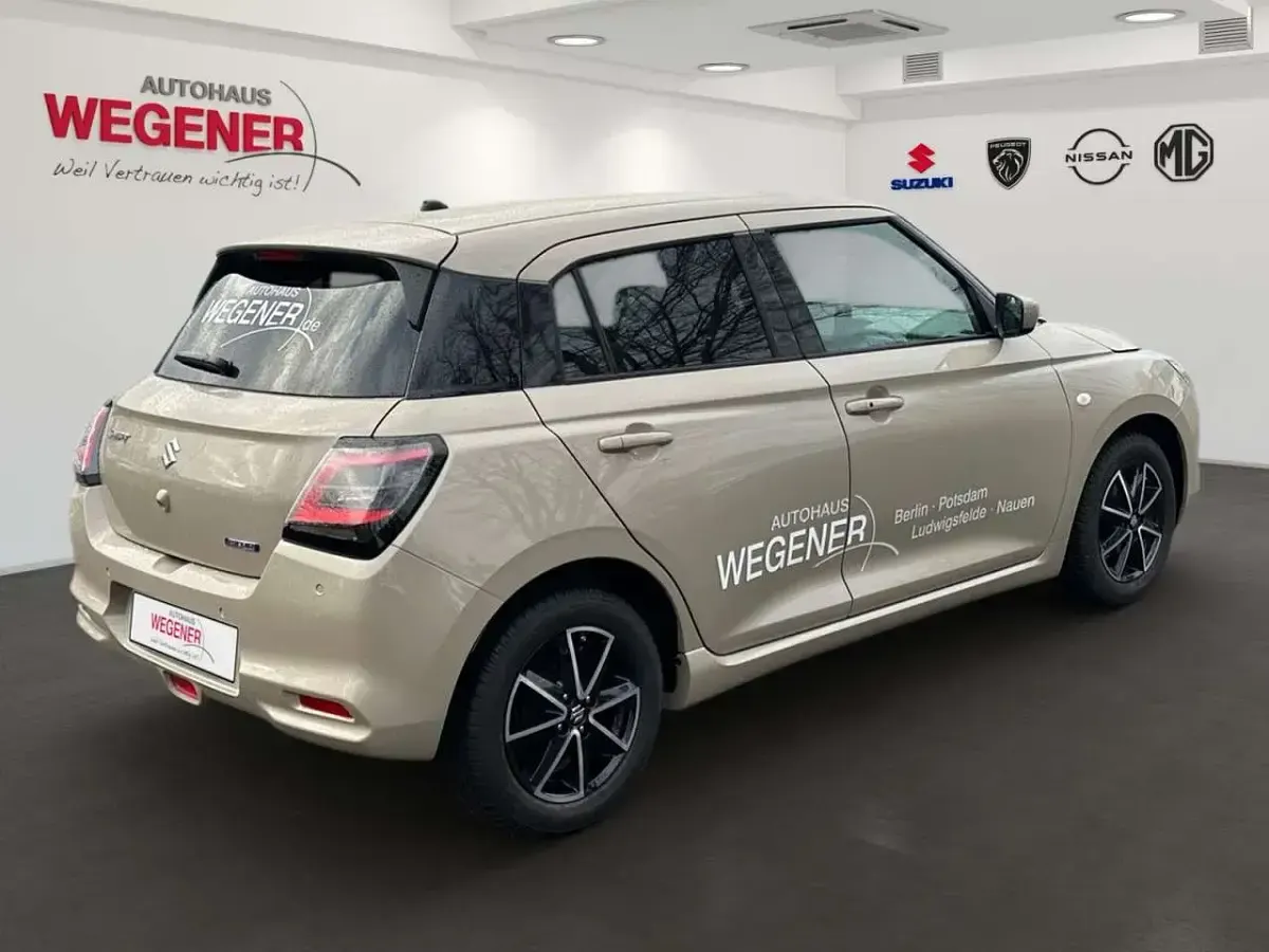 Gebraucht Suzuki Swift Comfort 83 PS (61 kW) 2025 Caravan ivory Limousine