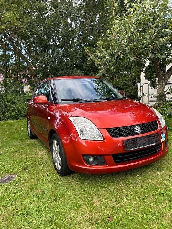 Rot Gebraucht 2008 Suzuki Swift Limousine | 1.600 € (Fairer Preis) - Bild 1/4